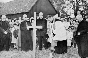 On October 4, 1953, Rt. Rev. Msgr. Henry E. Donnelly, head of the Eastern Deanery of the Detroit Archdiocese, breaks ground in Harper Woods to officially begin the construction of Notre Dame High School